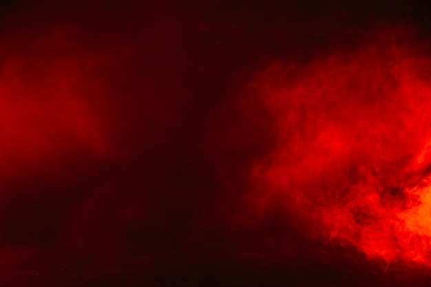 Photo red smoke in studio