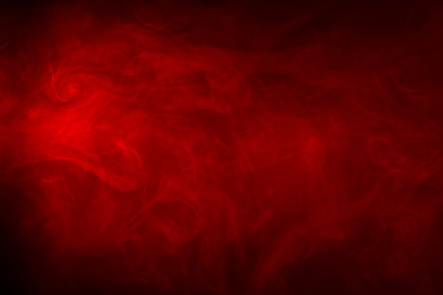 Photo red smoke texture on a black background