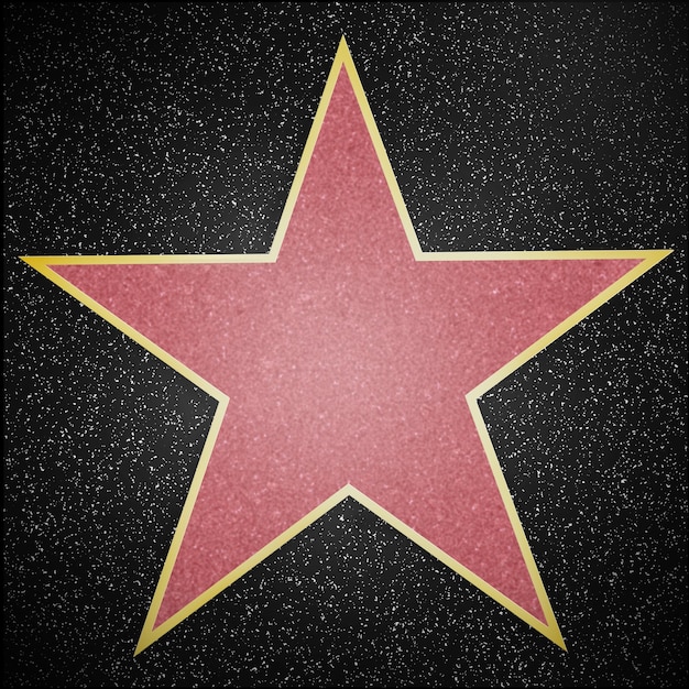 Photo a red star on a black background