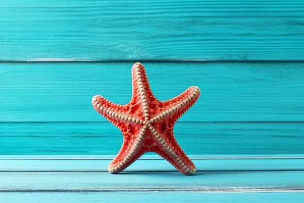 Red starfish on a blue wooden background