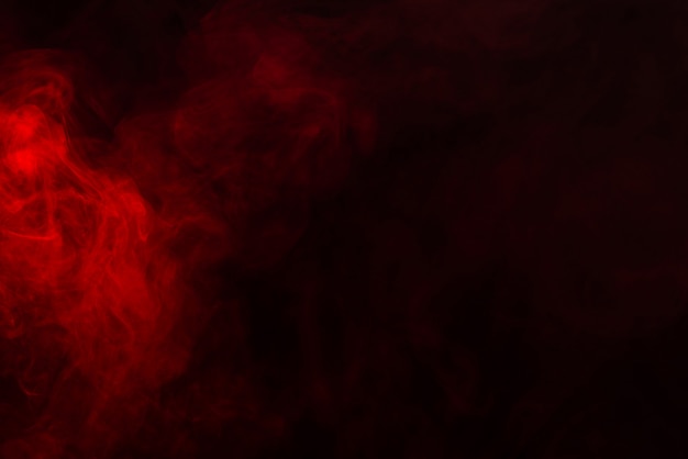 Red Smoke or Steam on a Black Background for Wallpapers and