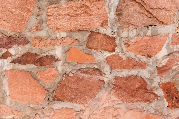 Red stone wall mountain texture and background