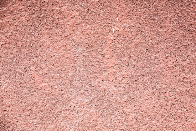 Red stone wall texture background.