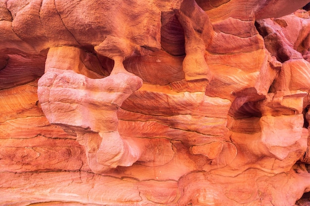 Red stones and the texture of the walls in Colored canyon, Sinai desert, Sinai peninsula, Egypt