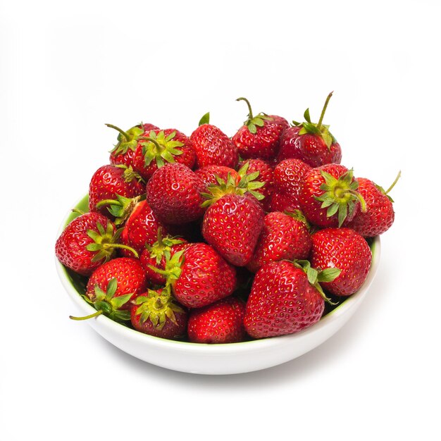 Red strawberry heap in plate