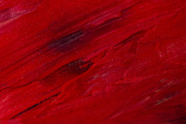 The red strokes are large embossed texture of the paint