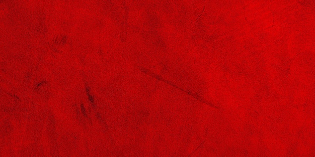 Red suede genuine leather background Velvet red background closeup photo