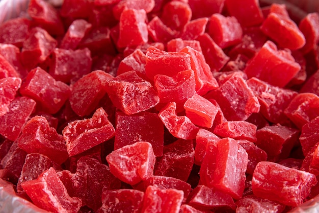 Red sweet dry fruits, dried fruit close-up on market shelf