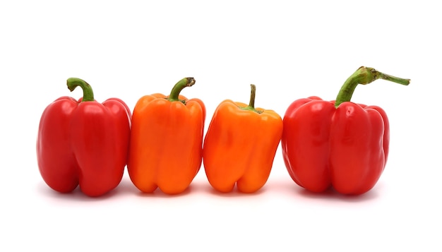 Red sweet peppers on a white background