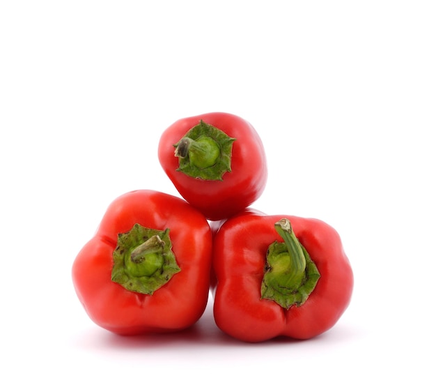 Red sweet peppers on a white background