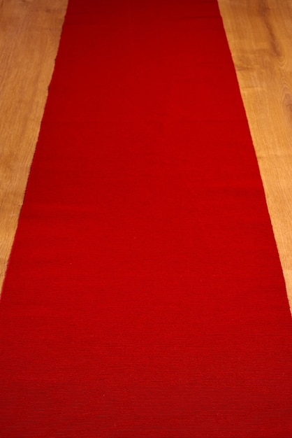 Red tablecloth on a wooden table.