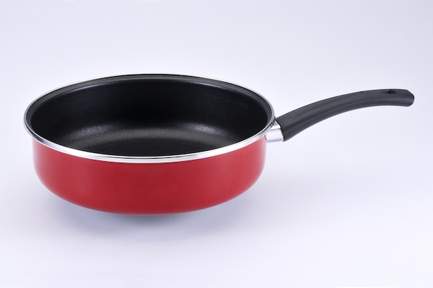 Red tall pan with black handle