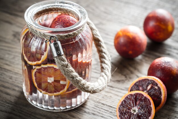 Photo red tangerines on the wooden surface