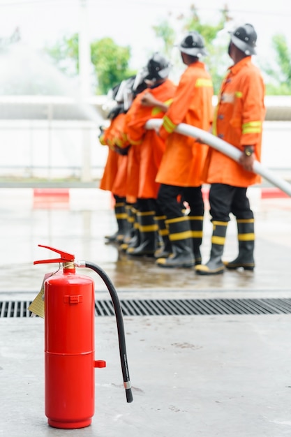 Red tank of fire extinguisher