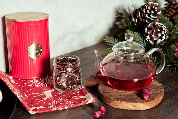 Red tea in a glass teapot