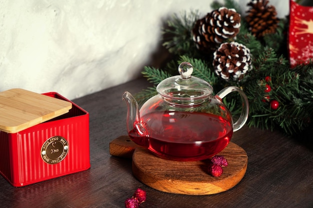 Red tea in a glass teapot