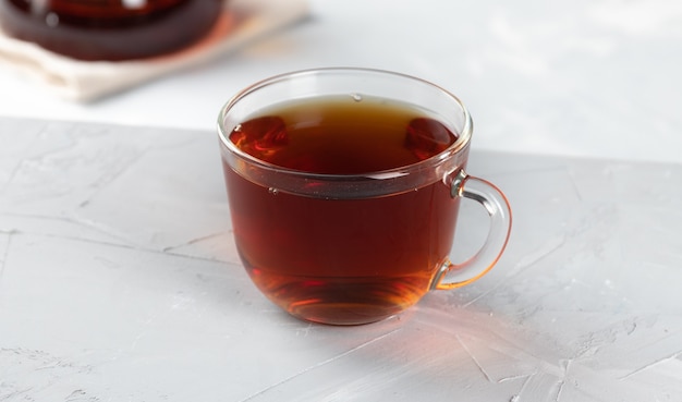 Red tea in a transparent glass