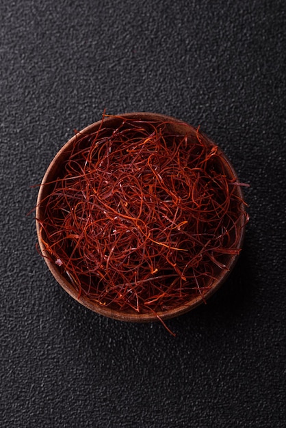 red thin hot chili threads on a dark background