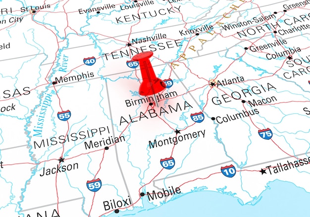 Photo red thumbtack over alabama state usa map. 3d rendering