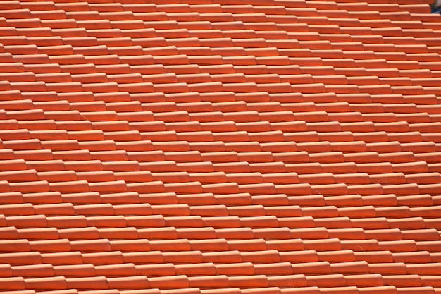 Red tiles roof background