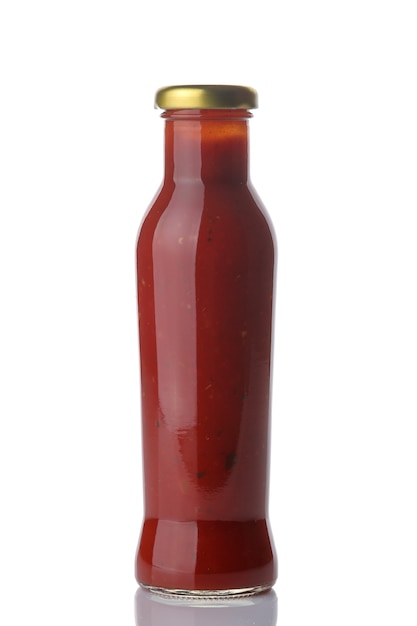 Red tomato sauce in a glass bottle