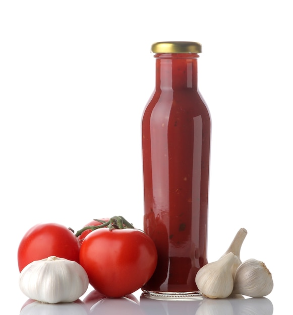 Red tomato sauce in a glass bottle