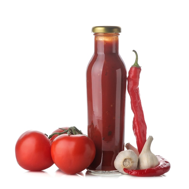 Red tomato sauce in a glass bottle