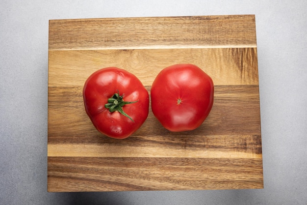 Red tomatoes in the background Close up