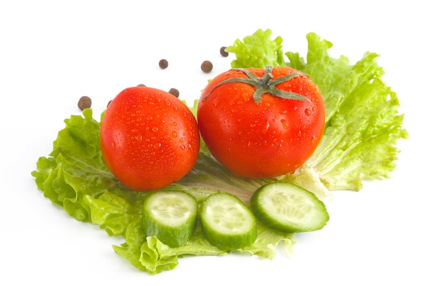 Red tomatoes, cucumber and lettuce