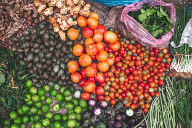 Red Tomatoes and others vegetables in the market