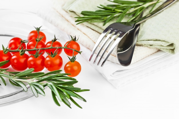 Red tomatoes on a white background