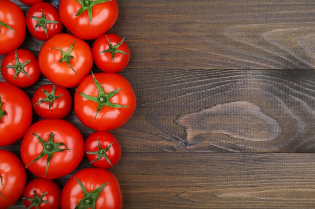 Red tomatoes with green tails