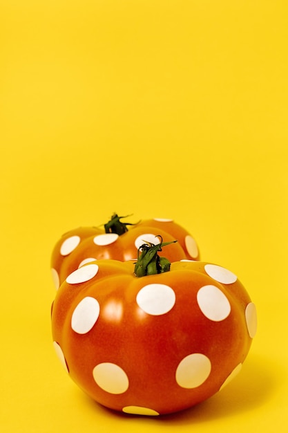 Red tomatoes with white polka dots