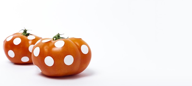 Red tomatoes with white polka dots