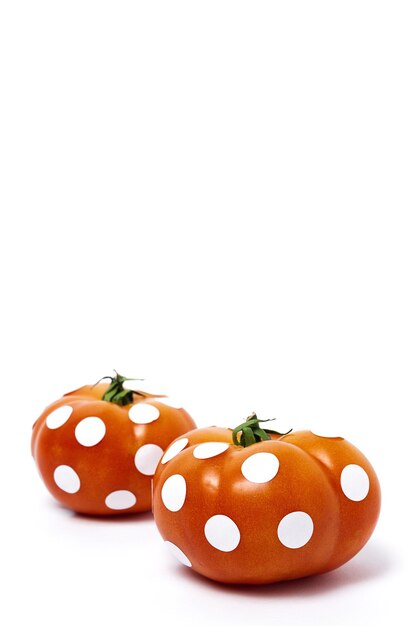 Red tomatoes with white polka dots