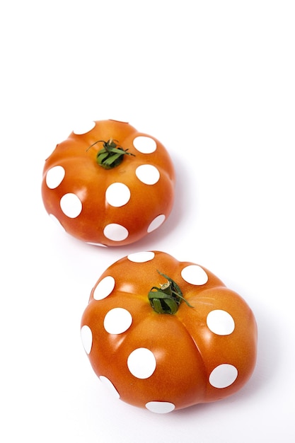 Red tomatoes with white polka dots