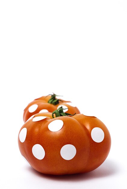 Red tomatoes with white polka dots