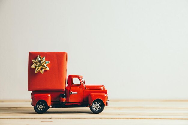 Photo red toy car against white background