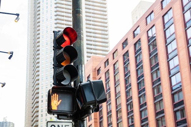 Red traffic lights for cars office buildings background Chicago city Illinois