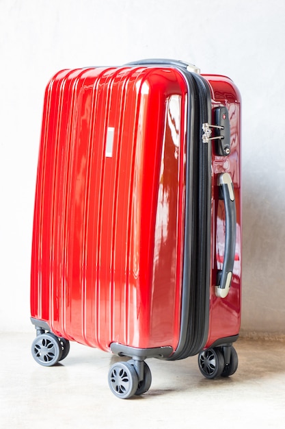 Photo red travel suitcase for outgoing