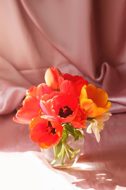 Red tulip flowers close up Bouquet in a vase