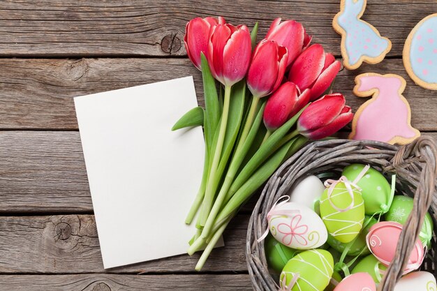 Red tulip flowers and easter eggs