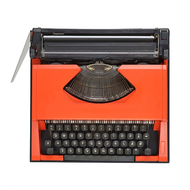 Red typewriter on white background