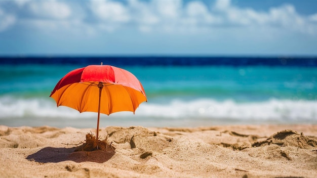 a red umbrella in the sand on a beach with the ocean in the background