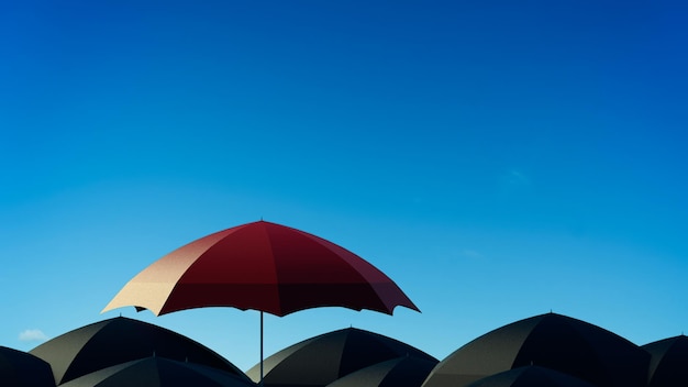 Ombrello rosso che si distingue da molti ombrelli neri. leadership, indipendenza, iniziativa, strategia, pensare in modo diverso, concetto di successo aziendale.
