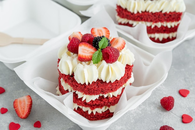 Red velvet bento cakesmall cake in a lunchbox on a gray concrete background Valentines Day Cake