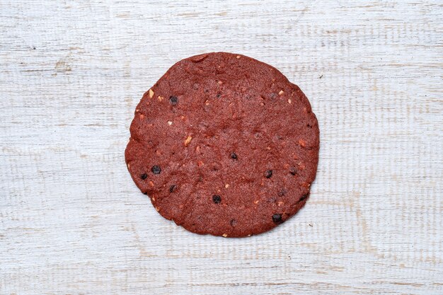 Red velvet cookies, butter cookies on white wooden