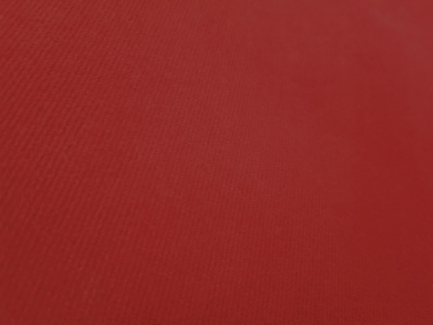 Photo red velvet fabric background in a luxurious style