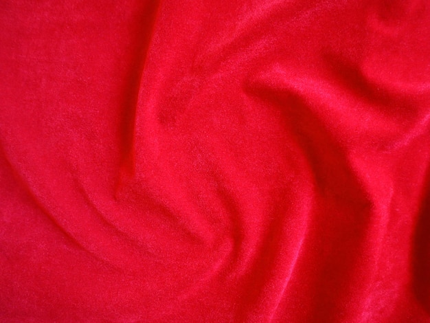 Red velvet fabric texture used as background Empty red fabric background of soft and smooth textile material There is space for text