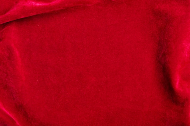 Trama del tessuto di velluto rosso utilizzato come sfondo sfondo di tessuto rosso di materiale tessile morbido e liscio c'è spazio per textx9